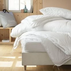 Essix Couettes Et Oreillers Bébé Et Enfant Couette Naturelle Blanc 140x200 -Lits enfant Soldes couette naturelle blanc 140x200 3